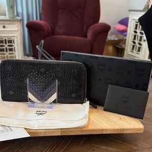 MCM Aren zip-around wallet, featuring the brand's signature Visetos monogram